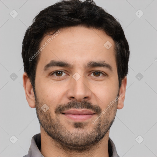 Joyful white young-adult male with short  black hair and brown eyes