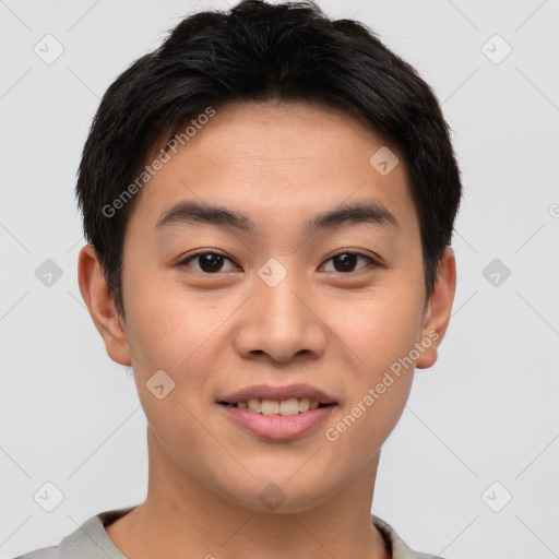 Joyful asian young-adult male with short  brown hair and brown eyes