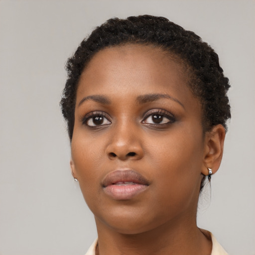 Neutral black young-adult female with short  black hair and brown eyes