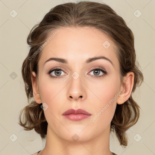 Neutral white young-adult female with medium  brown hair and green eyes