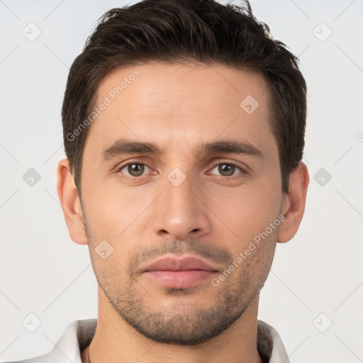 Neutral white young-adult male with short  brown hair and brown eyes