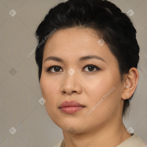 Joyful asian young-adult female with medium  brown hair and brown eyes