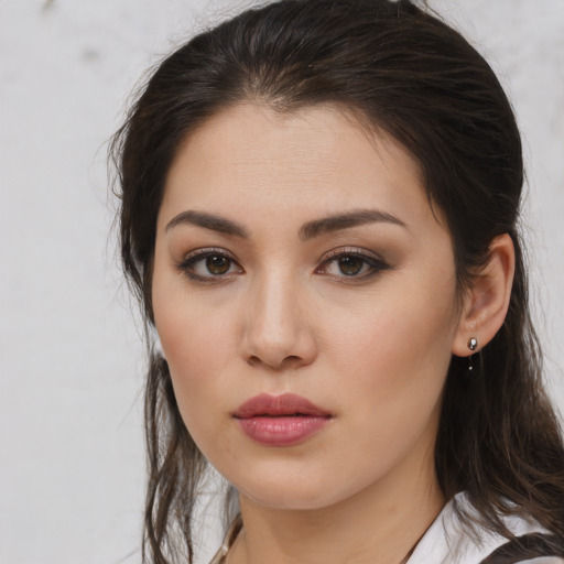 Neutral white young-adult female with medium  brown hair and brown eyes