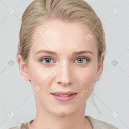 Joyful white young-adult female with short  brown hair and blue eyes