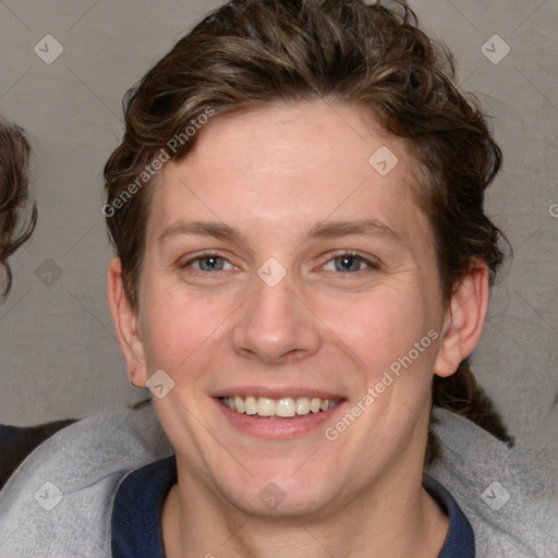 Joyful white young-adult female with medium  brown hair and blue eyes