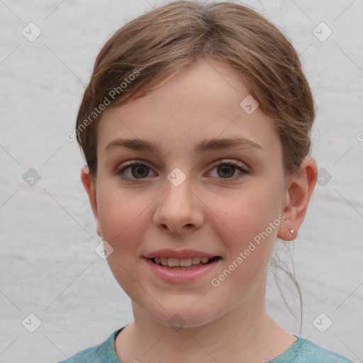 Joyful white child female with short  brown hair and grey eyes