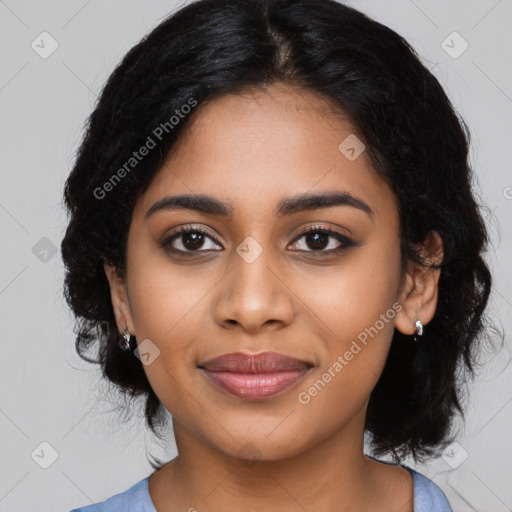 Joyful latino young-adult female with medium  black hair and brown eyes