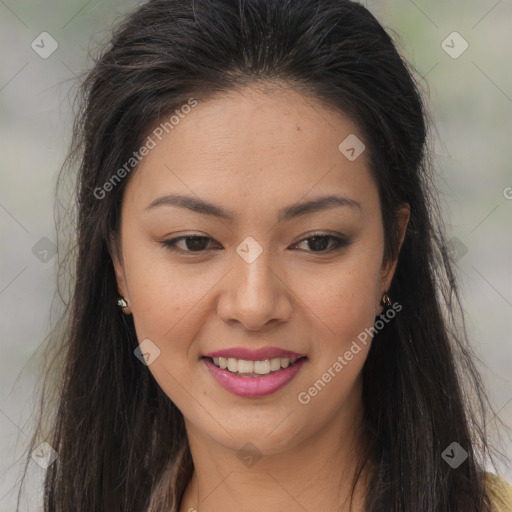 Joyful latino young-adult female with long  brown hair and brown eyes