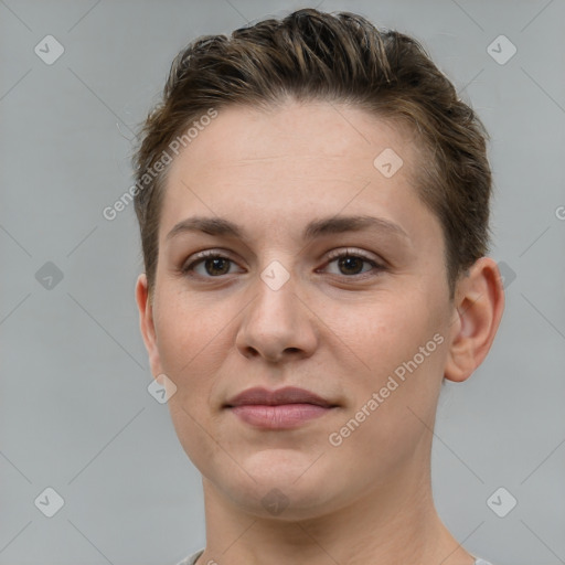 Joyful white young-adult female with short  brown hair and grey eyes