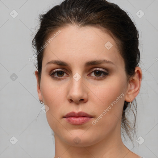 Neutral white young-adult female with medium  brown hair and brown eyes