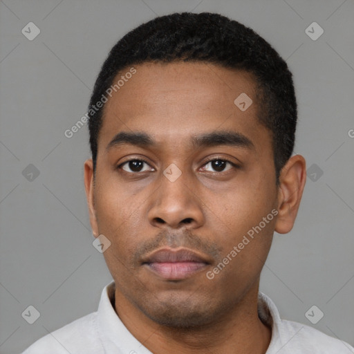 Neutral latino young-adult male with short  black hair and brown eyes