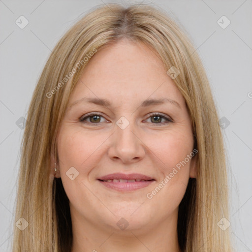 Joyful white young-adult female with long  brown hair and brown eyes