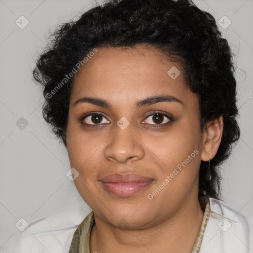 Joyful black young-adult female with long  brown hair and brown eyes