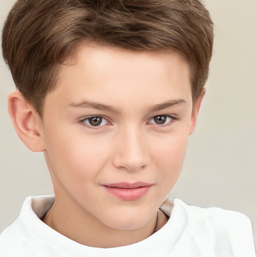 Joyful white child male with short  brown hair and brown eyes