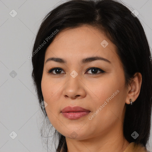 Joyful asian young-adult female with medium  black hair and brown eyes