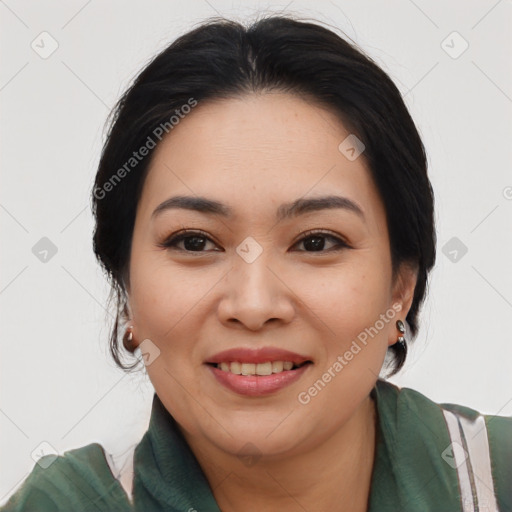 Joyful asian young-adult female with medium  brown hair and brown eyes