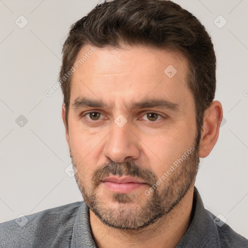 Neutral white adult male with short  brown hair and brown eyes