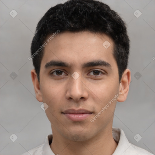 Joyful white young-adult male with short  black hair and brown eyes