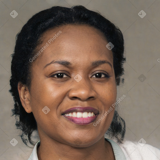 Joyful black young-adult female with medium  black hair and brown eyes