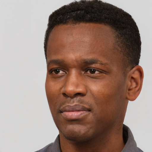Neutral black young-adult male with short  black hair and brown eyes