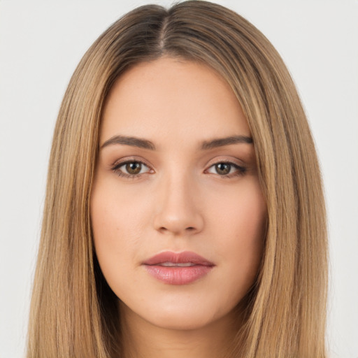 Neutral white young-adult female with long  brown hair and brown eyes