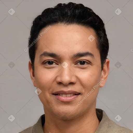 Joyful white young-adult male with short  black hair and brown eyes