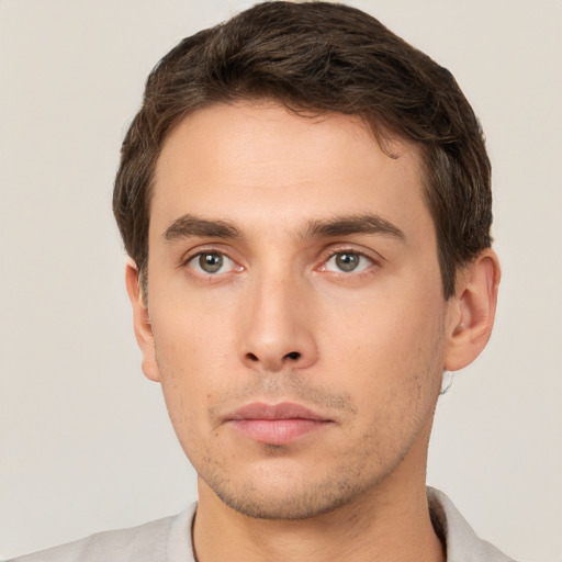 Neutral white young-adult male with short  brown hair and brown eyes