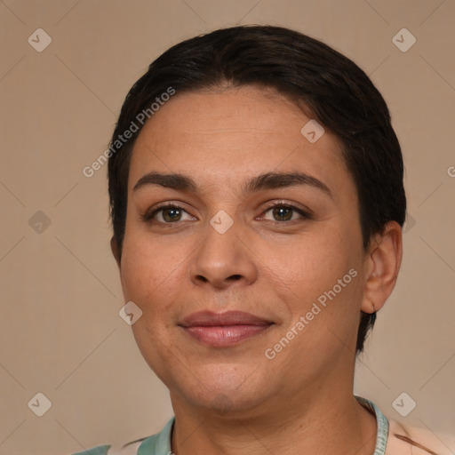 Joyful white young-adult female with short  brown hair and brown eyes