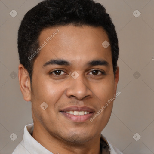 Joyful latino young-adult male with short  brown hair and brown eyes