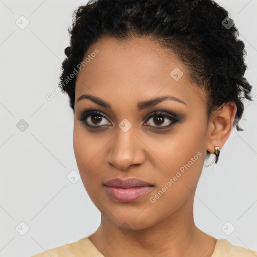 Joyful latino young-adult female with short  brown hair and brown eyes