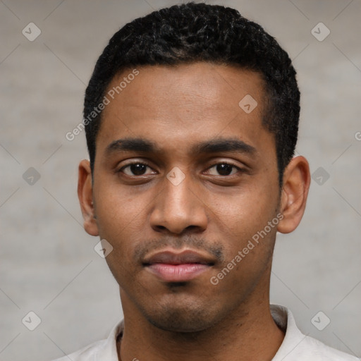 Neutral latino young-adult male with short  black hair and brown eyes