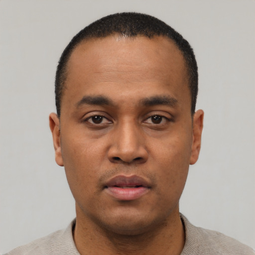 Neutral black young-adult male with short  black hair and brown eyes