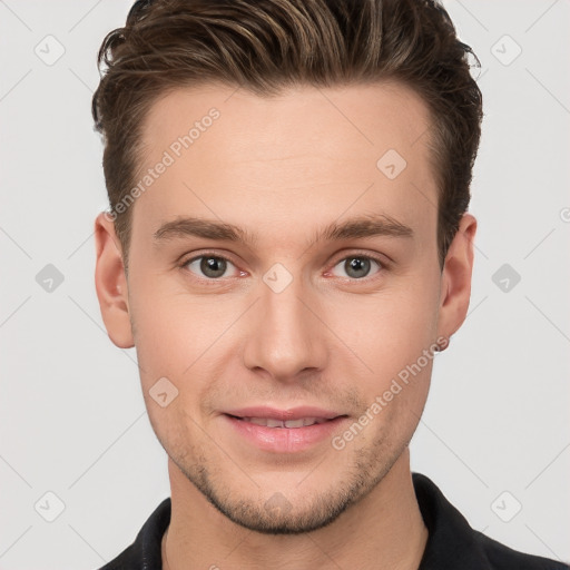 Joyful white young-adult male with short  brown hair and grey eyes