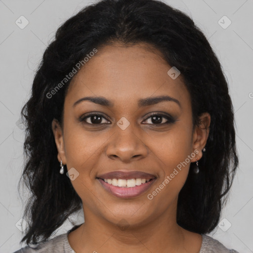 Joyful black young-adult female with medium  black hair and brown eyes