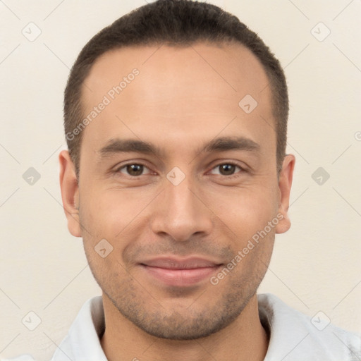 Joyful white young-adult male with short  brown hair and brown eyes