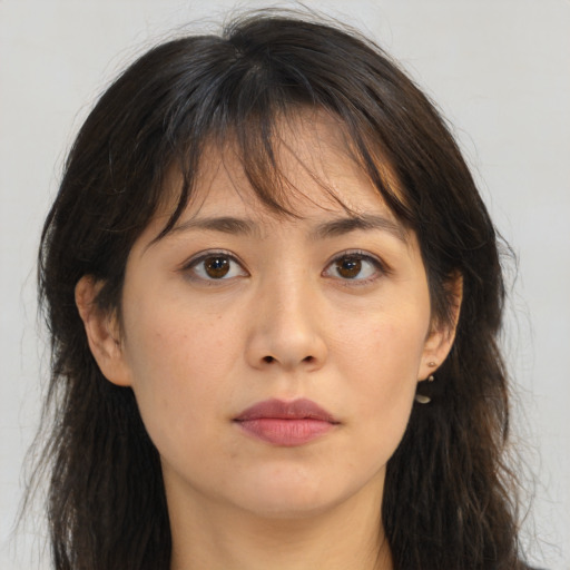 Neutral asian young-adult female with medium  brown hair and brown eyes
