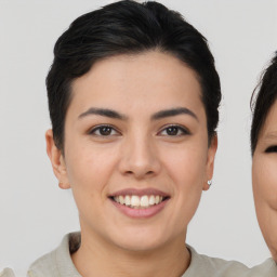 Joyful asian young-adult female with short  brown hair and brown eyes