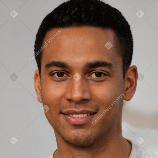 Joyful latino young-adult male with short  brown hair and brown eyes