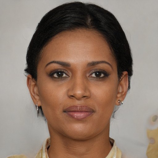 Neutral black young-adult female with medium  brown hair and brown eyes