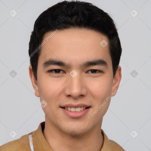 Joyful asian young-adult male with short  black hair and brown eyes