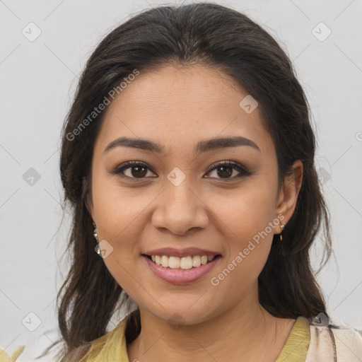 Joyful latino young-adult female with medium  brown hair and brown eyes