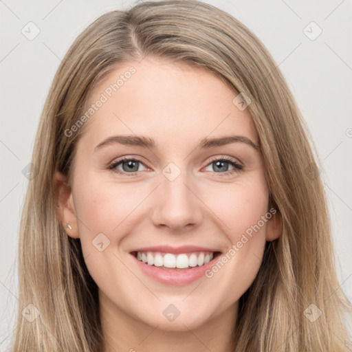 Joyful white young-adult female with long  brown hair and grey eyes