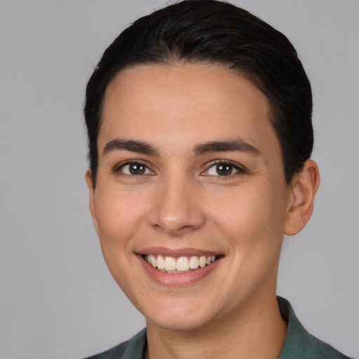 Joyful white young-adult female with short  brown hair and brown eyes