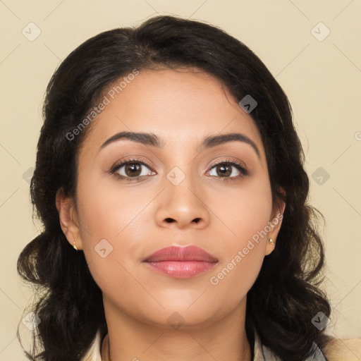 Joyful latino young-adult female with long  brown hair and brown eyes