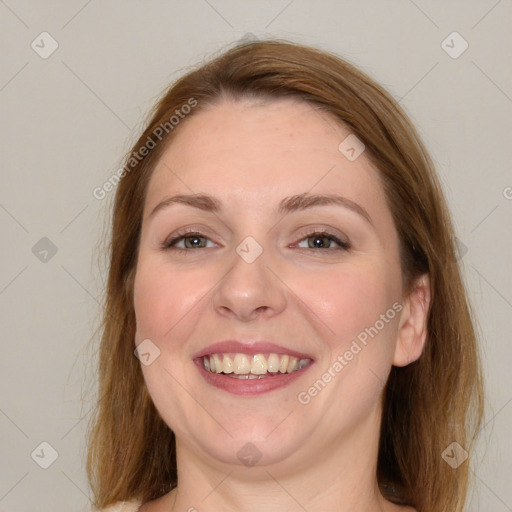 Joyful white young-adult female with medium  brown hair and blue eyes