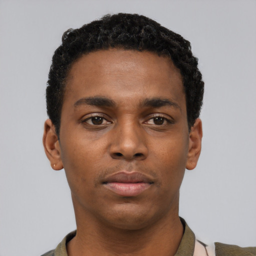 Neutral black young-adult male with short  black hair and brown eyes