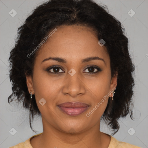 Joyful black young-adult female with medium  brown hair and brown eyes