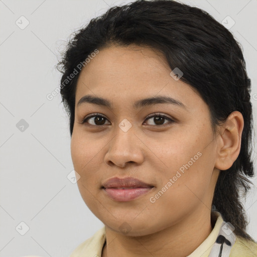 Joyful latino young-adult female with medium  black hair and brown eyes