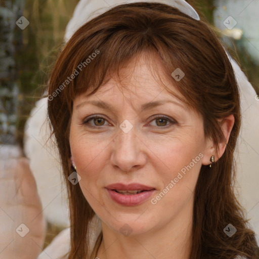 Joyful white adult female with medium  brown hair and brown eyes