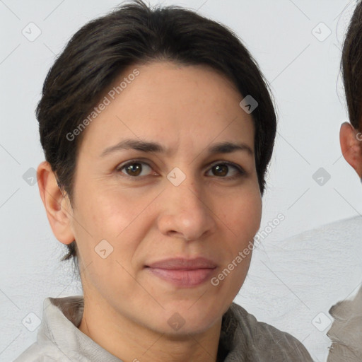 Joyful white adult female with medium  brown hair and brown eyes